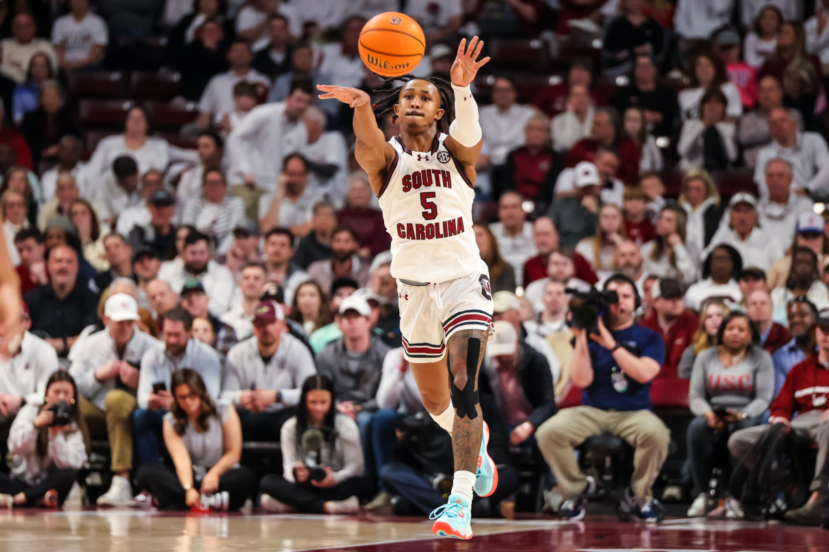 Meechie Johnson passes against the Mississippi Rebels (02=06-24)